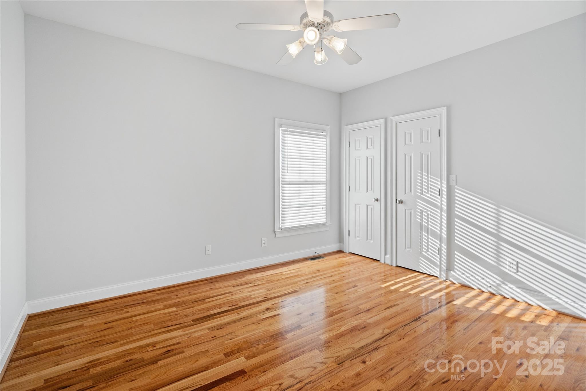 3310 Millstone Creek Road Lancaster, SC 29720 - Photo 28 of 45 a view of empty room with wooden floor and fan