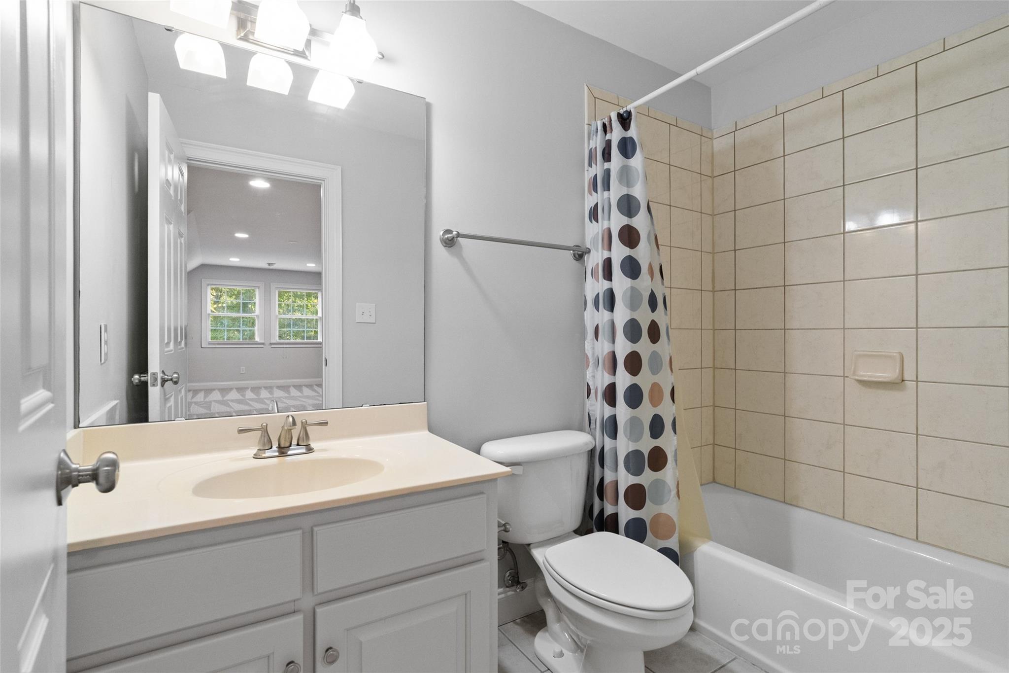 3310 Millstone Creek Road Lancaster, SC 29720 - Photo 32 of 45 a bathroom with a sink a toilet and shower