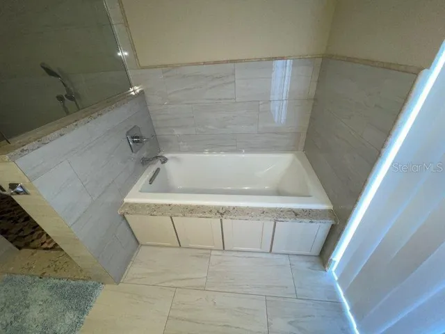 a bathroom with a bathtub