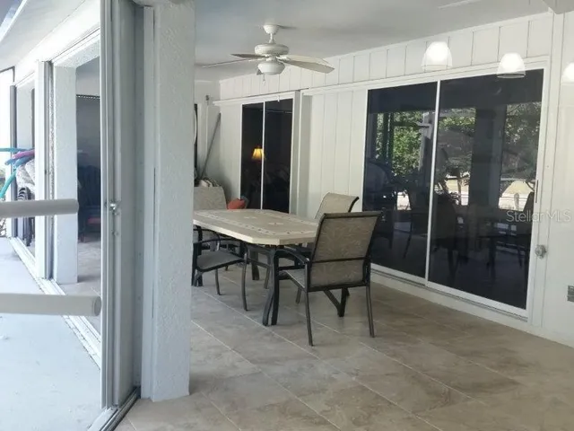 a view of a livingroom with furniture and window