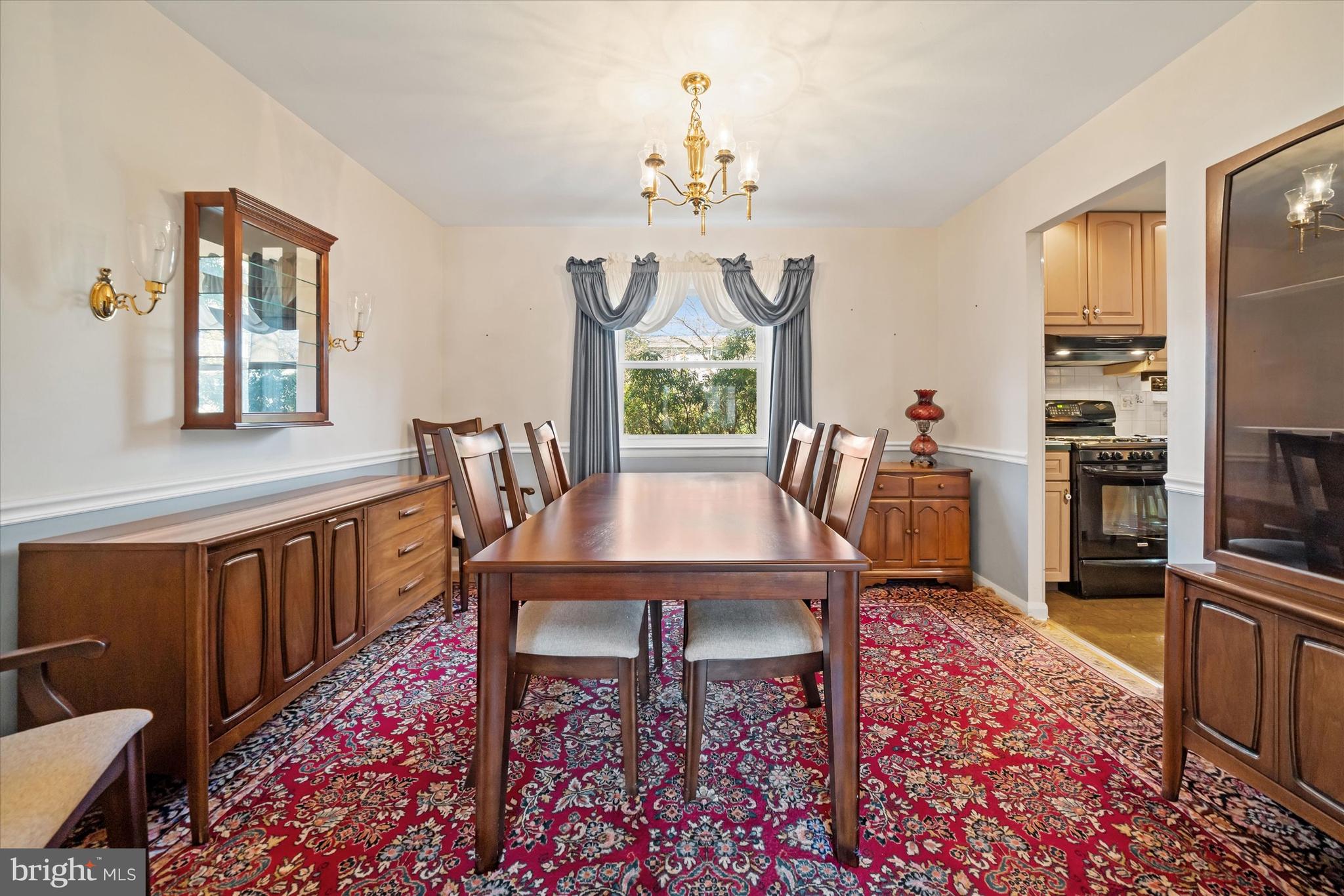 2605 Cayuga Road Wilmington, DE 19810 - Photo 11 of 53 a view of a dining room with furniture window and wooden floor