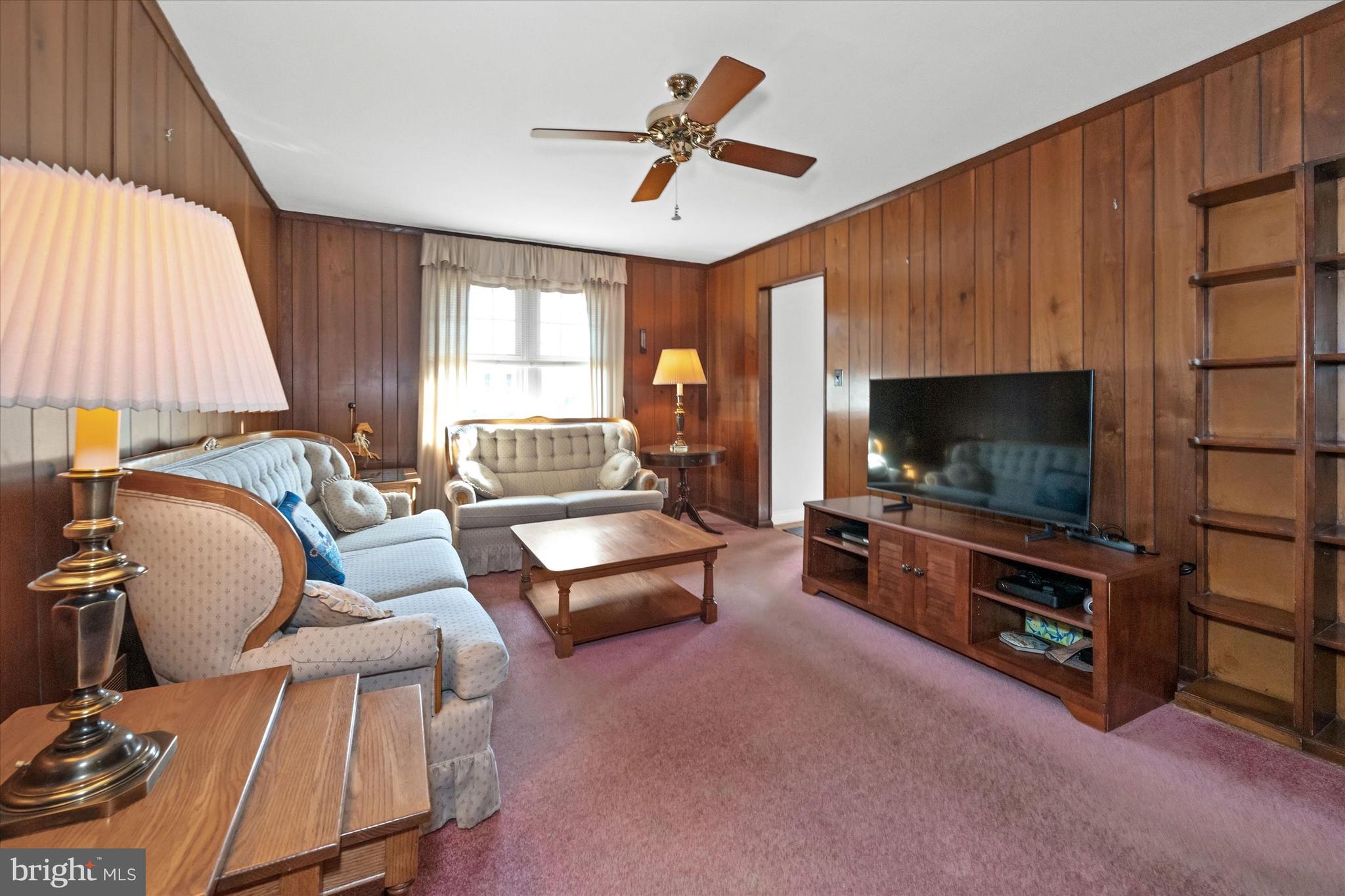 2605 Cayuga Road Wilmington, DE 19810 - Photo 21 of 53 a living room with furniture and a flat screen tv