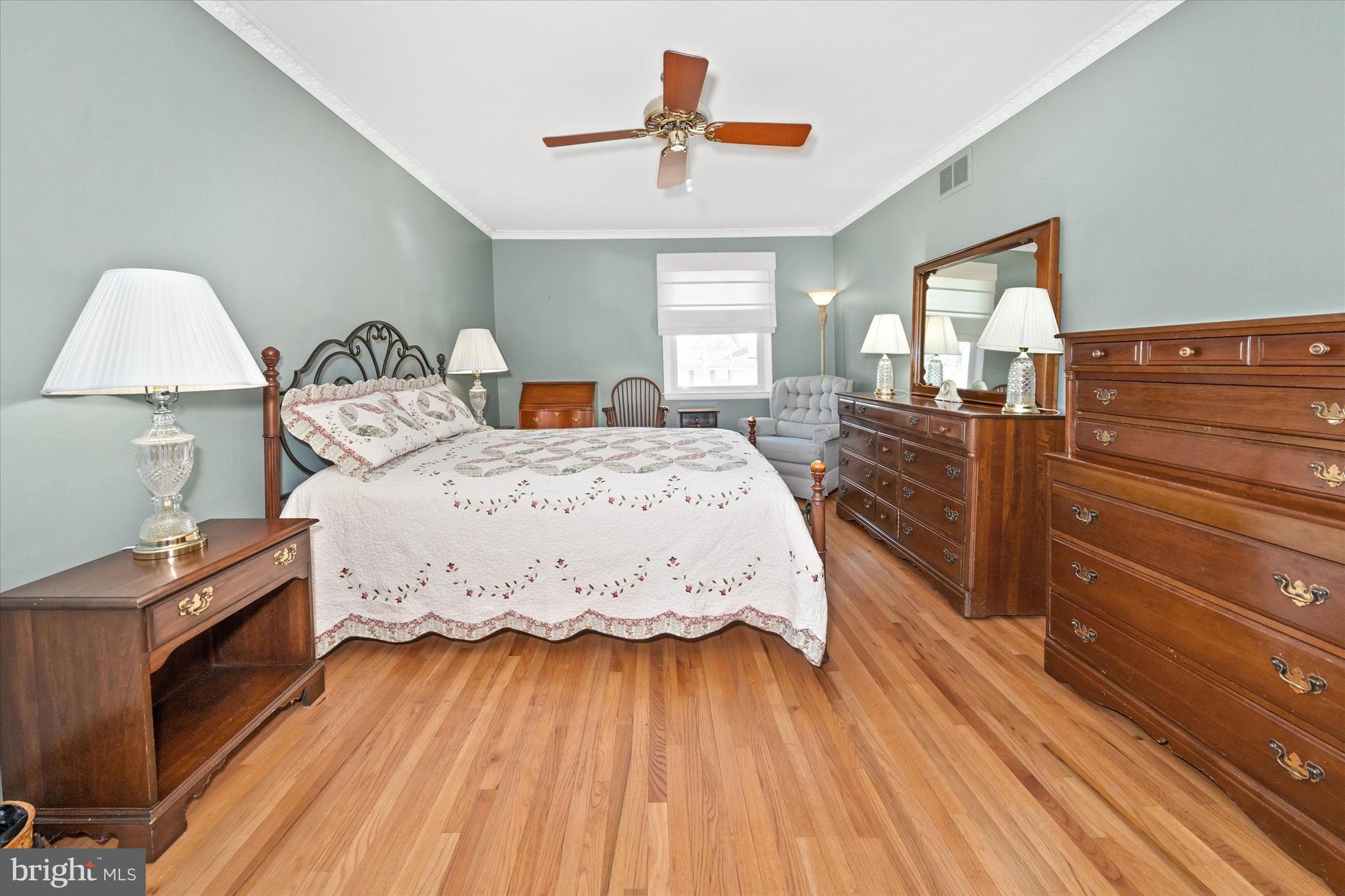 2605 Cayuga Road Wilmington, DE 19810 - Photo 24 of 53 a bedroom with a bed and a dresser