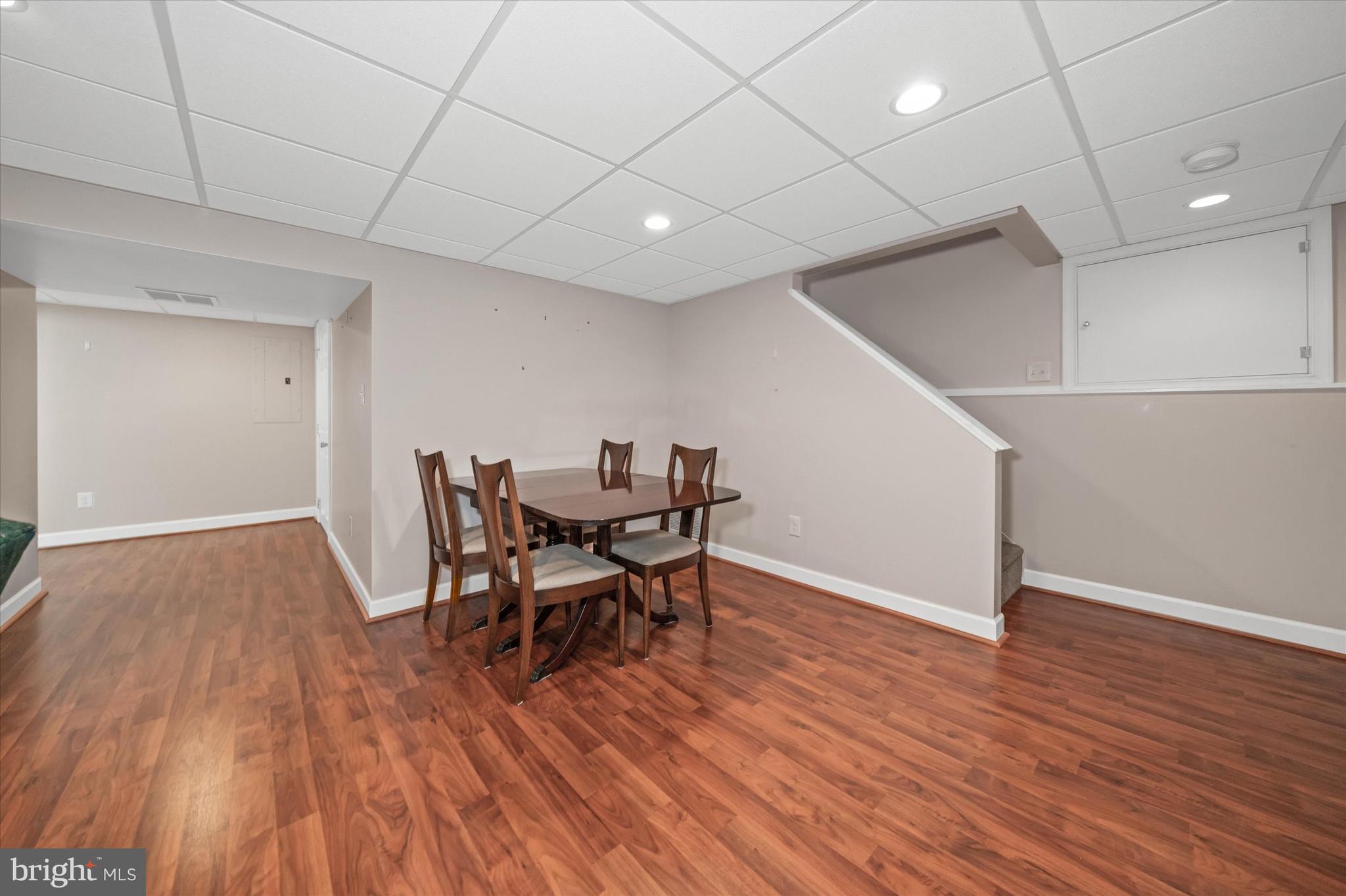 2605 Cayuga Road Wilmington, DE 19810 - Photo 38 of 53 a view of a dining room with furniture and wooden floor