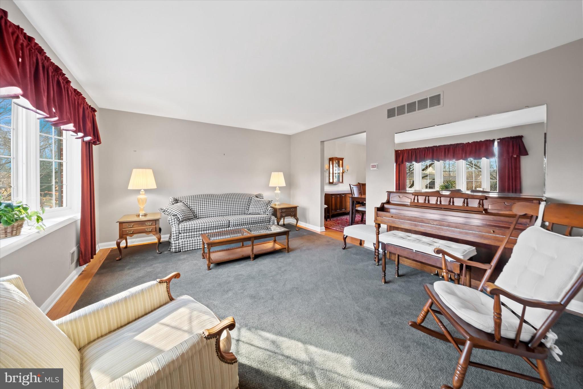 2605 Cayuga Road Wilmington, DE 19810 - Photo 8 of 53 a living room with furniture and a fireplace