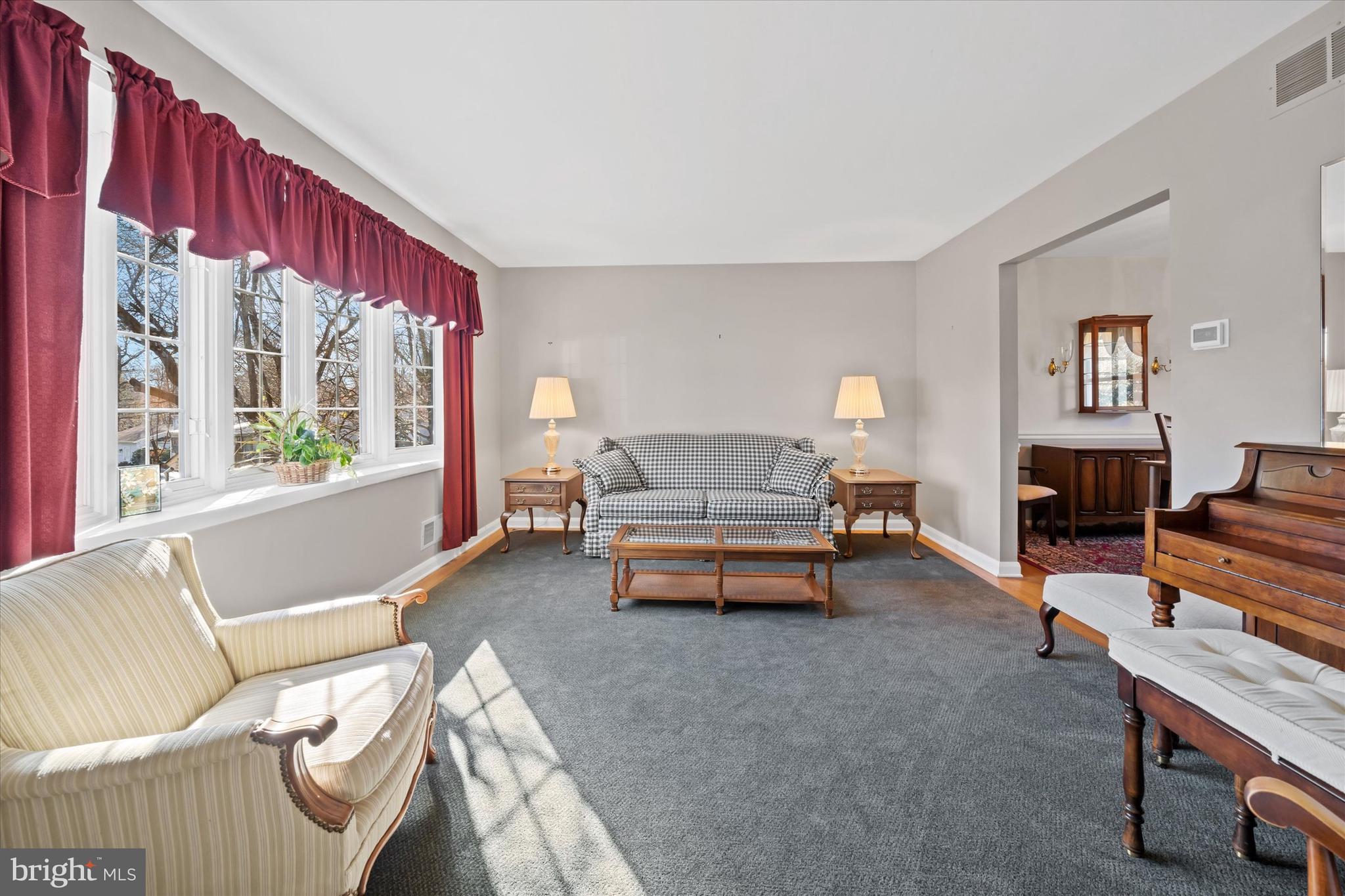 2605 Cayuga Road Wilmington, DE 19810 - Photo 9 of 53 a living room with furniture and a large window