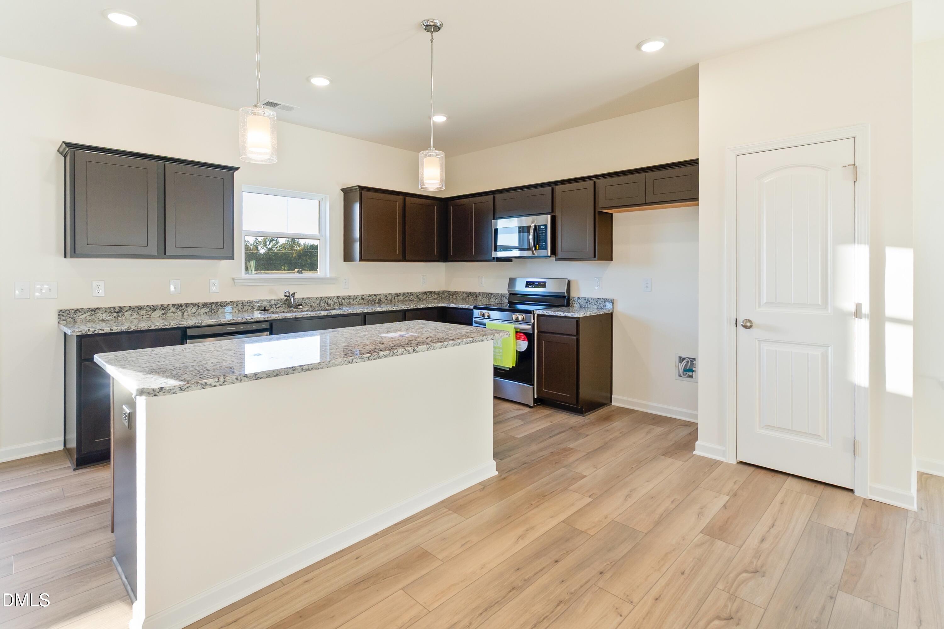 136 Bruce Drive Dunn, NC 28334 - Photo 4 of 26 Large Center Island