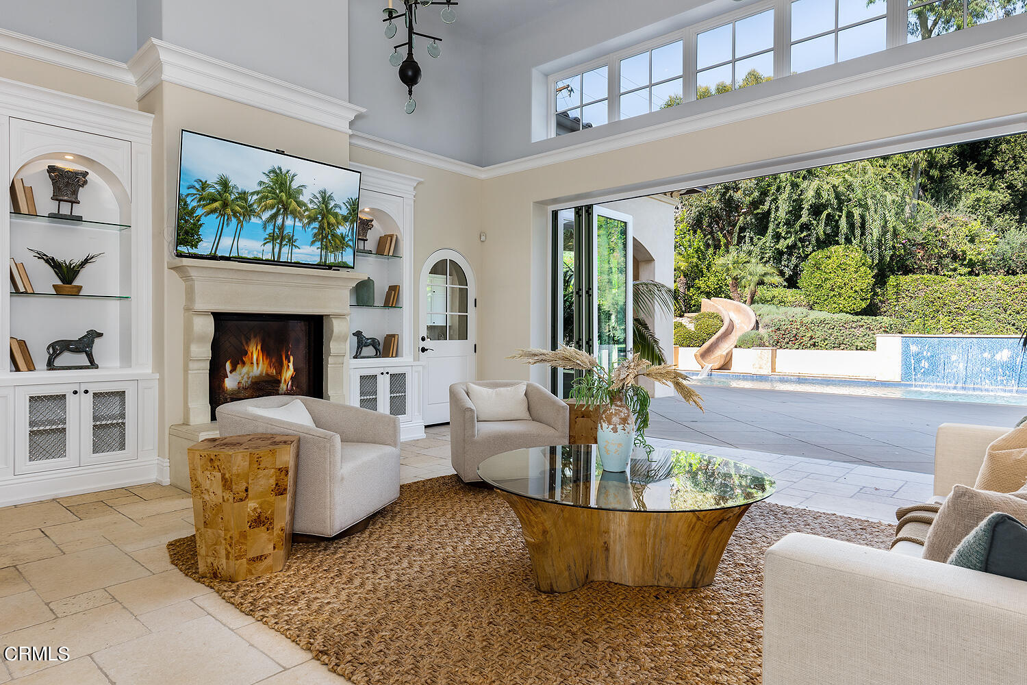 1610 Kinneloa Mesa Road Pasadena, CA 91107 - Photo 13 of 72 a living room with fireplace furniture and a large window