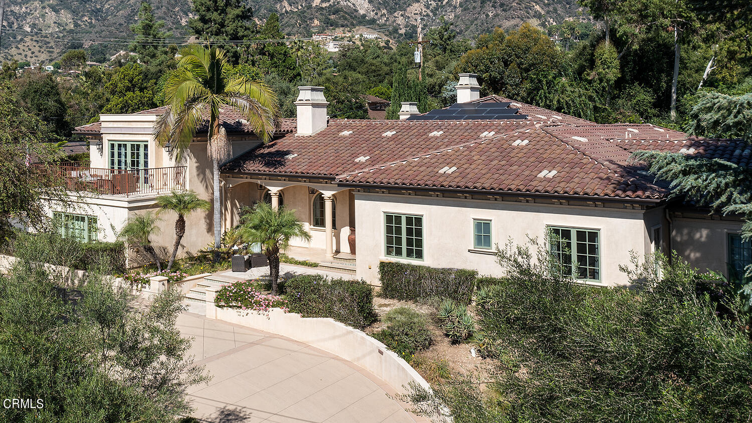 1610 Kinneloa Mesa Road Pasadena, CA 91107 - Photo 2 of 72 a front view of a house with a yard and trees