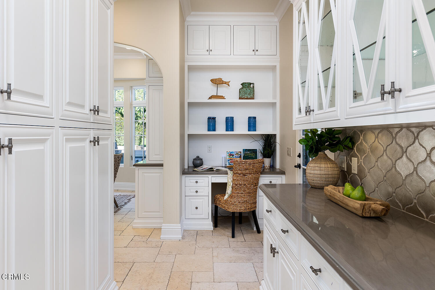 1610 Kinneloa Mesa Road Pasadena, CA 91107 - Photo 22 of 72 a kitchen with stainless steel appliances granite countertop a cabinets and a view of living room