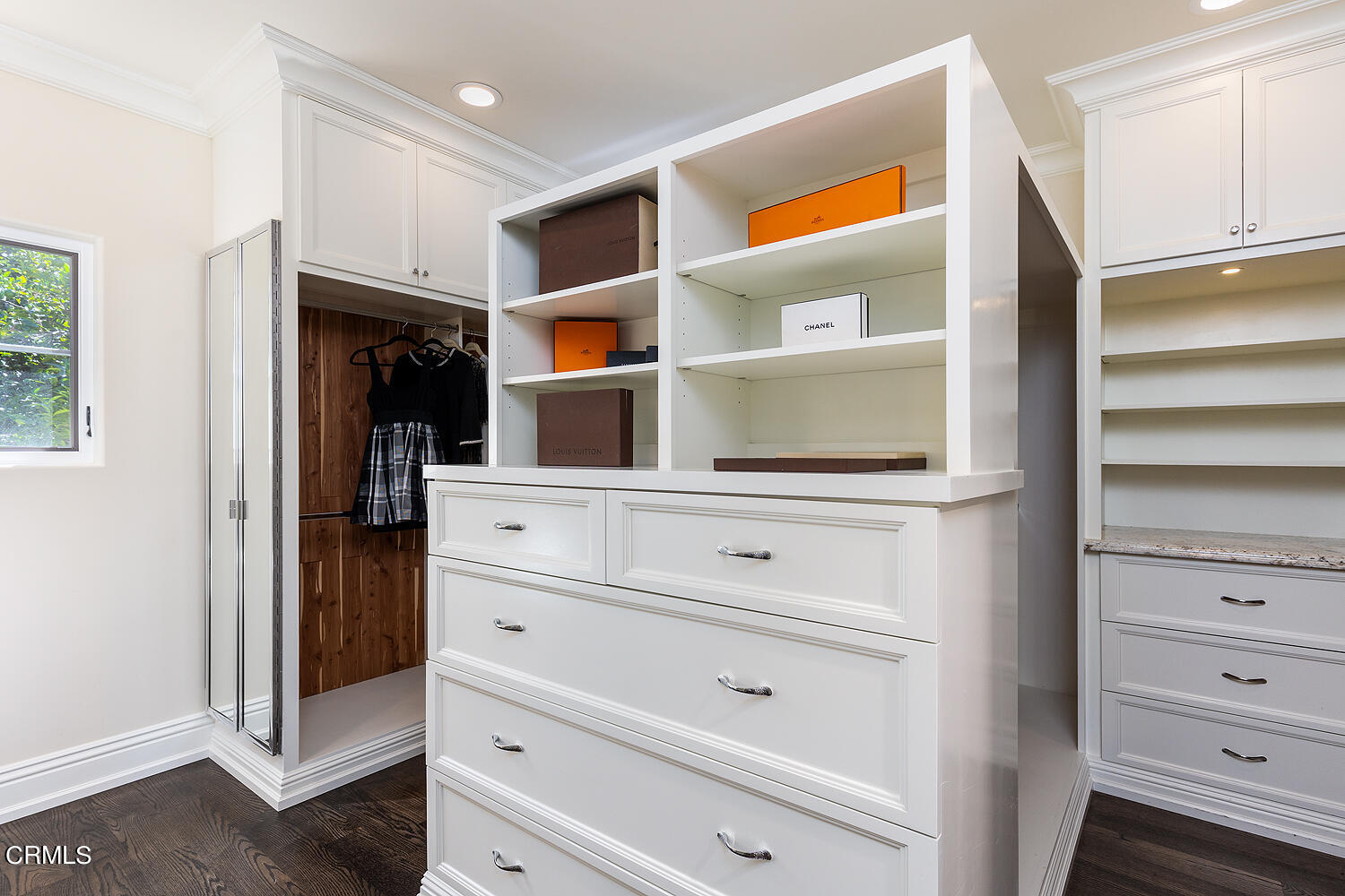 1610 Kinneloa Mesa Road Pasadena, CA 91107 - Photo 33 of 72 a view of walk in closet with clothes and shoes