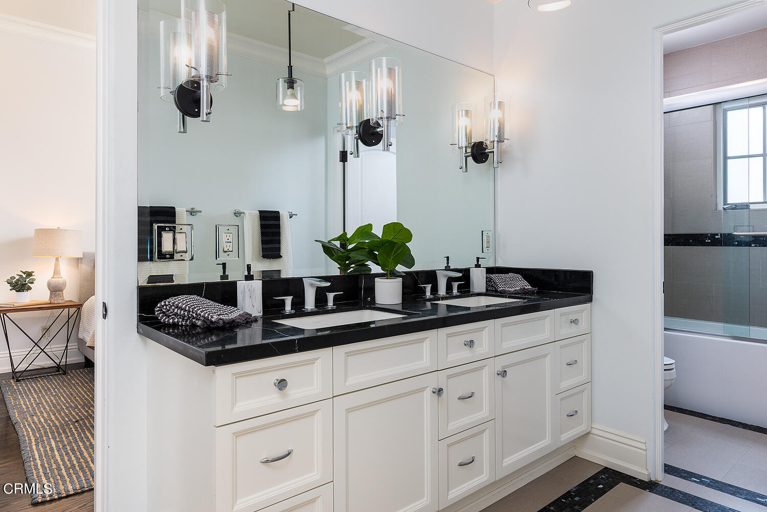 1610 Kinneloa Mesa Road Pasadena, CA 91107 - Photo 37 of 72 a bathroom with white cabinets and a sink