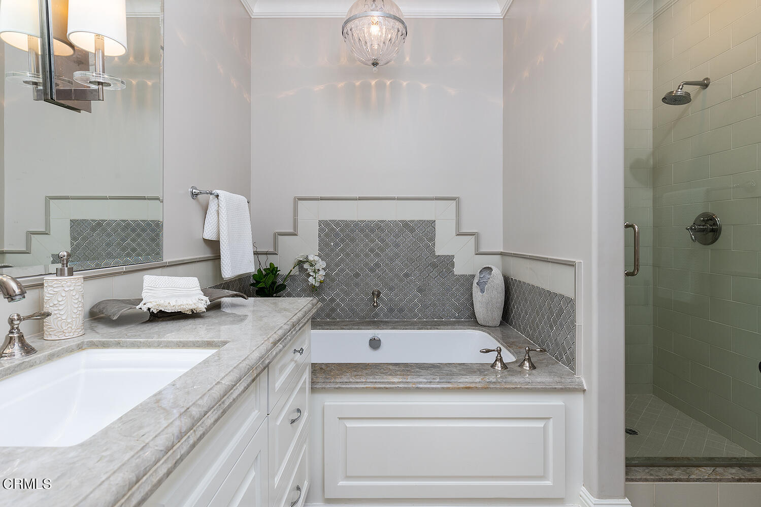 1610 Kinneloa Mesa Road Pasadena, CA 91107 - Photo 40 of 72 a bathroom with a granite countertop sink a toilet and shower