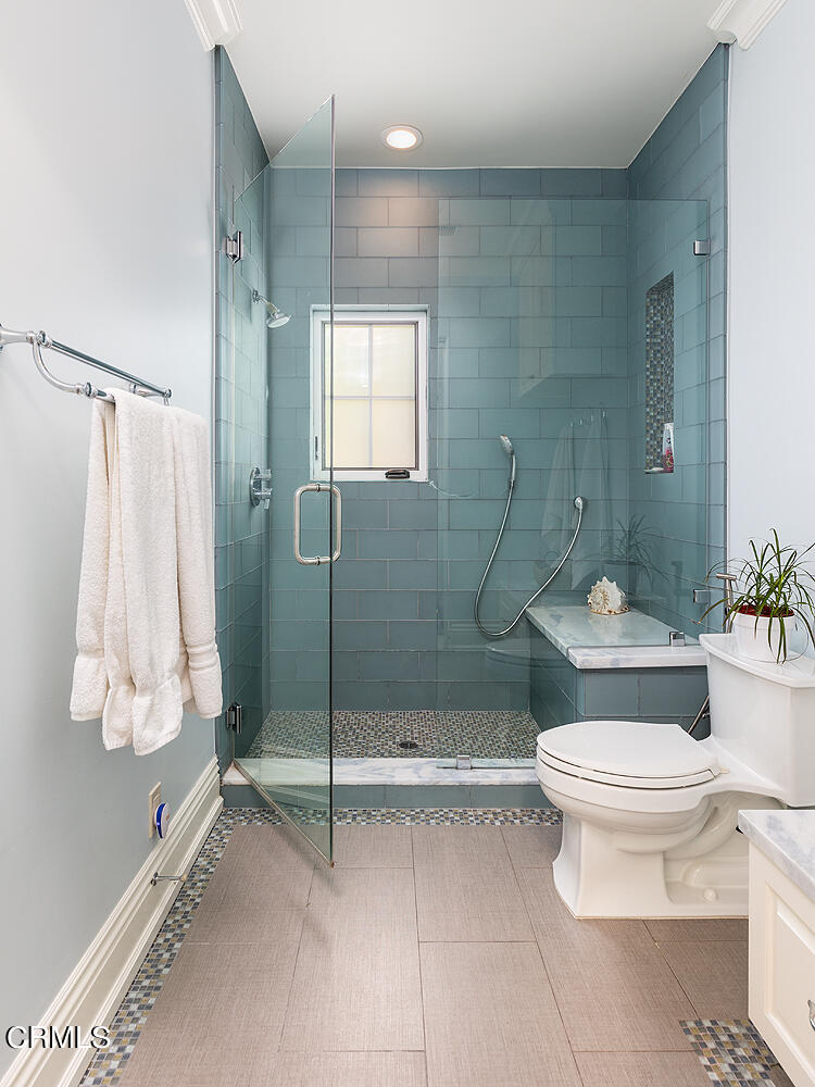 1610 Kinneloa Mesa Road Pasadena, CA 91107 - Photo 43 of 72 a bathroom with a toilet and a shower