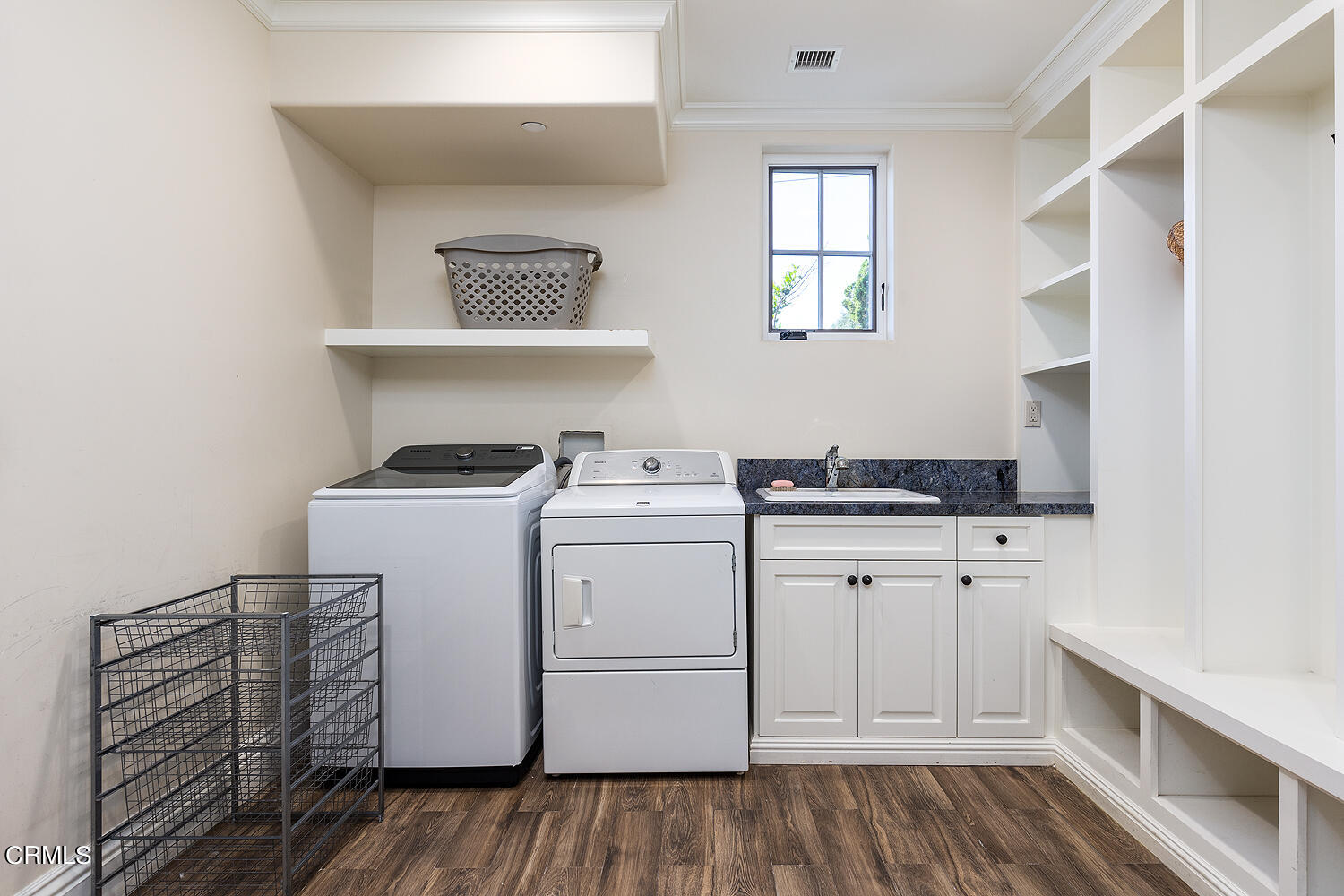 1610 Kinneloa Mesa Road Pasadena, CA 91107 - Photo 47 of 72 a utility room with cabinets washer and dryer