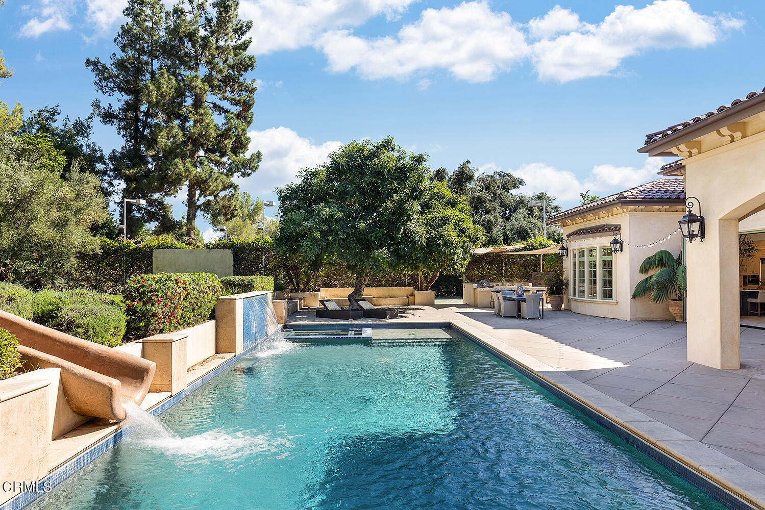 1610 Kinneloa Mesa Road Pasadena, CA 91107 - Photo 57 of 72 a view of a yard with furniture and a fire pit