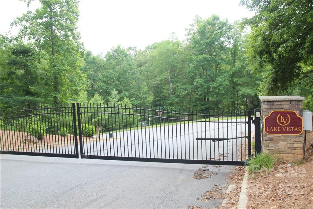 2038-2048 Inlet Shore Road Northeast, Unit 24 & 25 Connelly Springs, NC 28612 - Photo 6 of 13 a view of a street gate