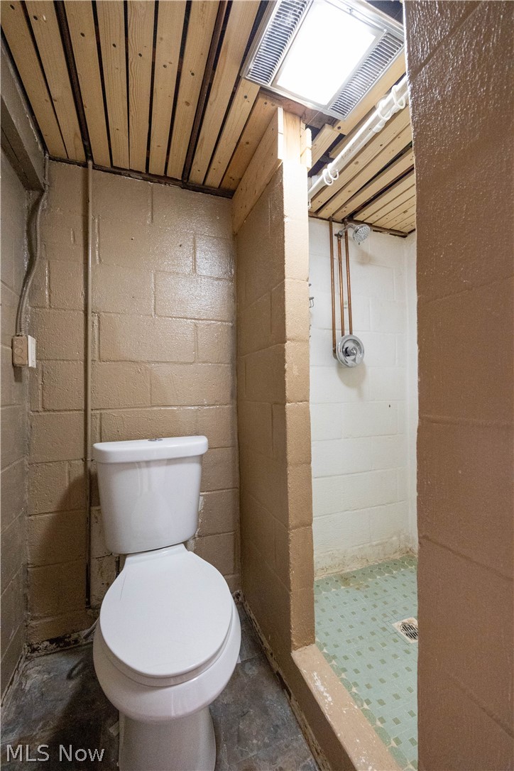 14474 Pease Road Maple Heights, OH 44137 - Photo 45 of 50 Bathroom with tile floors, toilet, wood ceiling, and a shower