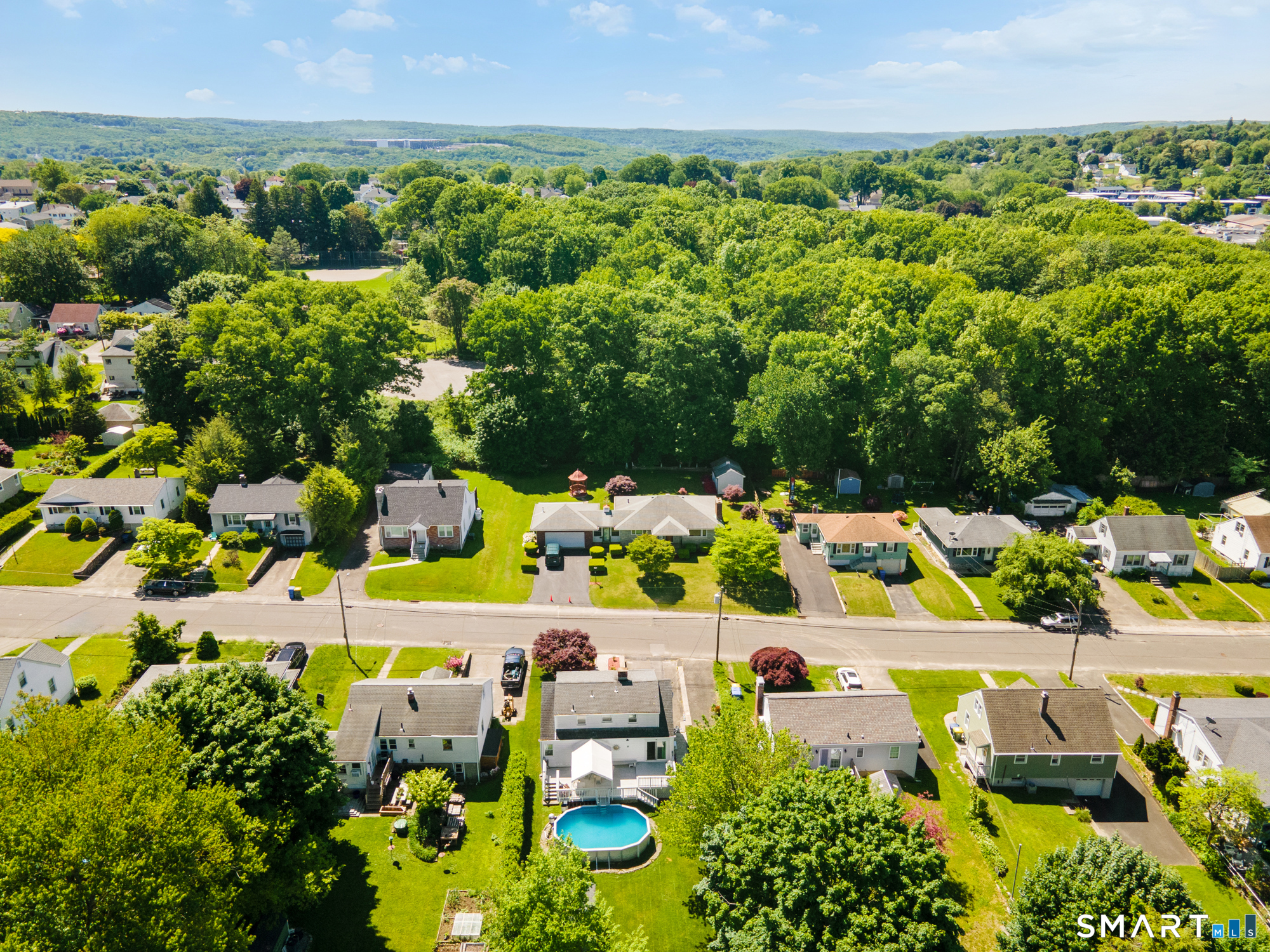 146 Highland Drive Waterbury, CT 06708 - Photo 28 of 31 an aerial view of a house with a yard and lake view
