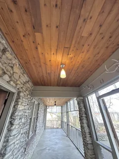 a view of a livingroom with wooden floor