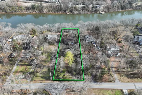 a house that has tree in front of it