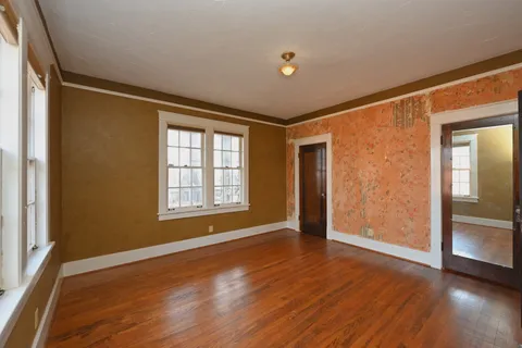 a view of a room with an empty space