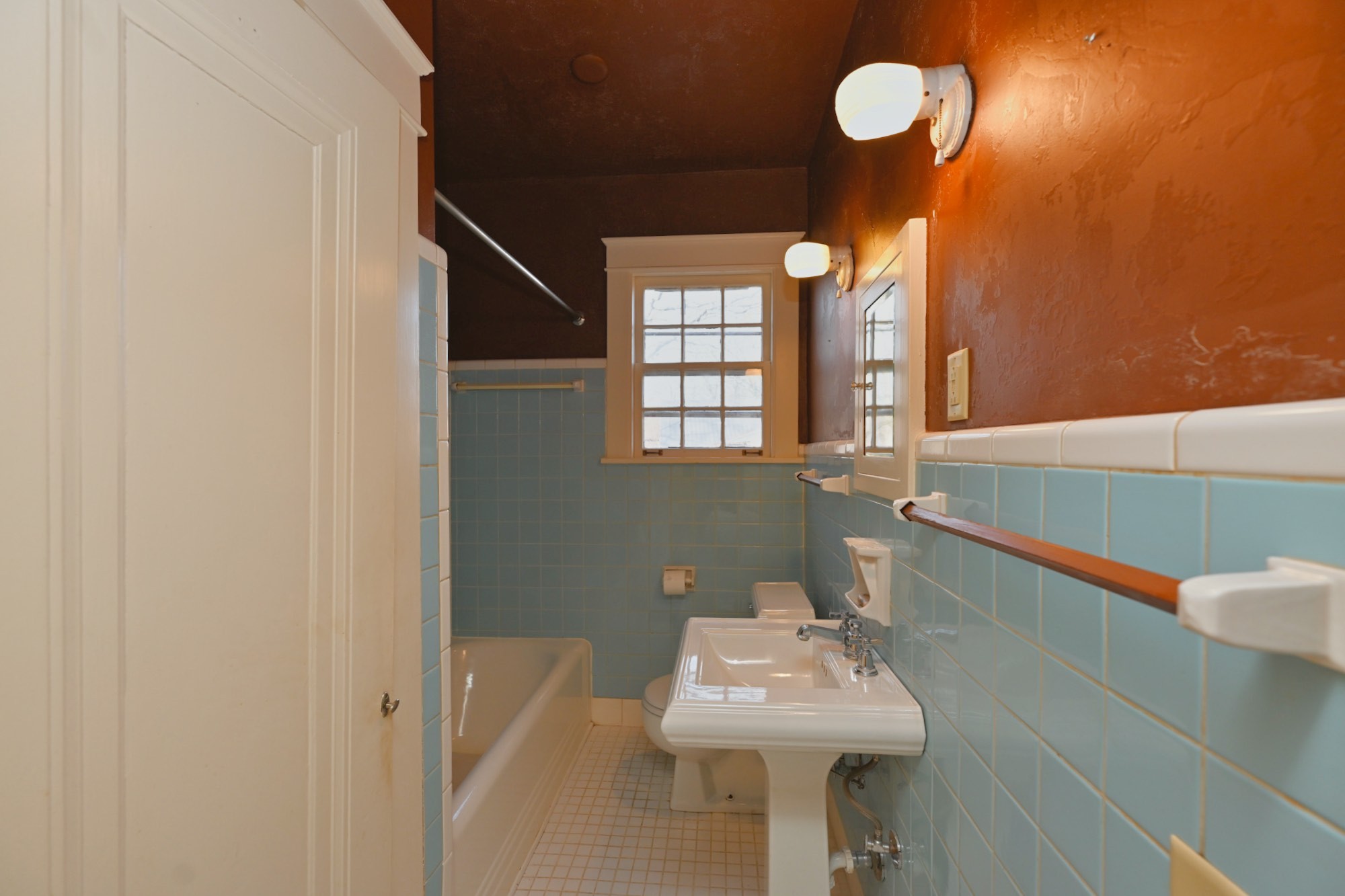 4228 Brush Hill Road Nashville, TN 37216 - Photo 34 of 100 a bathroom with a sink a mirror and a window