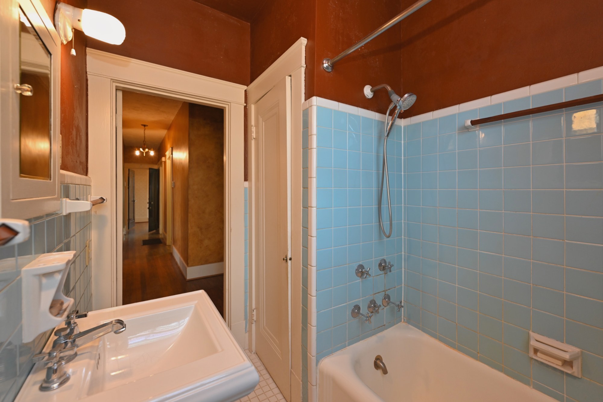 4228 Brush Hill Road Nashville, TN 37216 - Photo 36 of 100 a bathroom with a tub a sink and mirrors