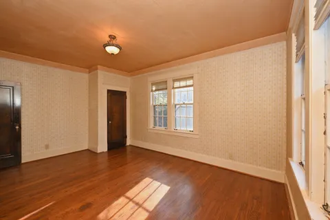 a view of a room with wooden walls