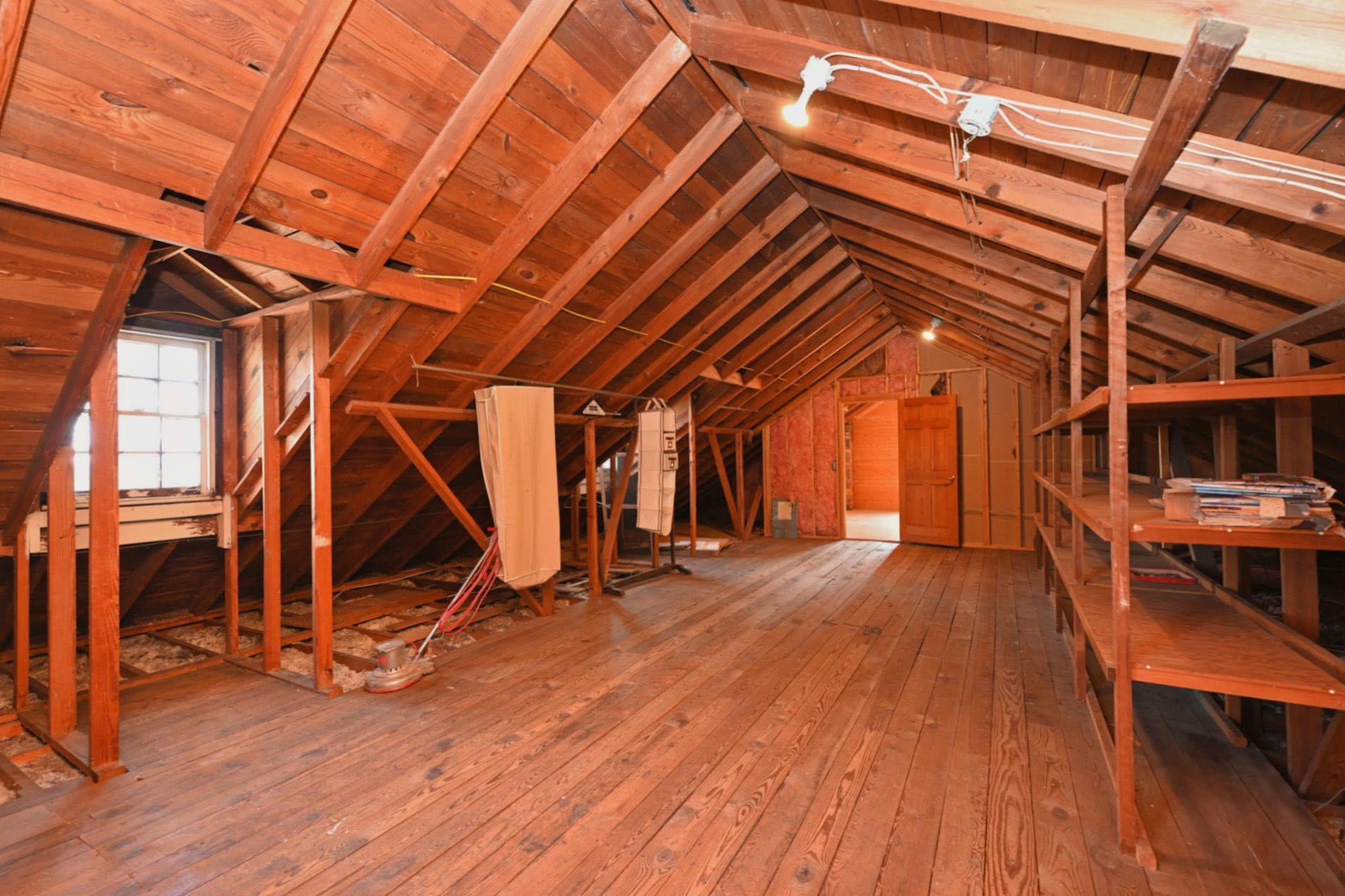 4228 Brush Hill Road Nashville, TN 37216 - Photo 49 of 100 a view of an empty room with wooden floor and stairs