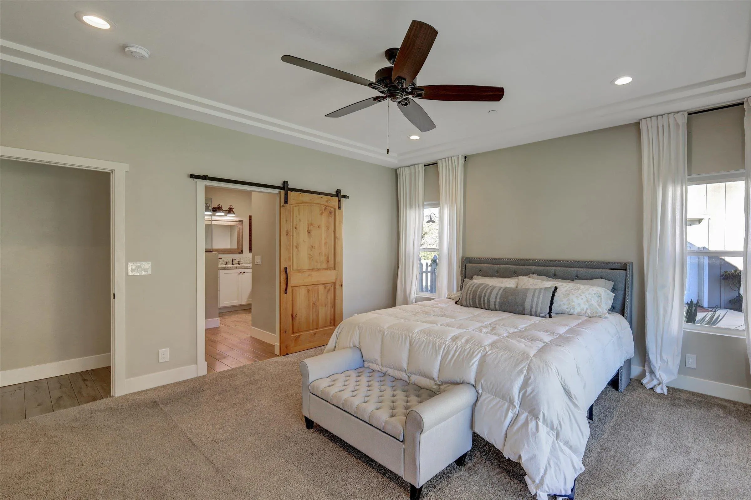 11611 Rancho Heights Road Pala, CA 92059 - Photo 13 of 43 a bedroom with a bed and a ceiling fan