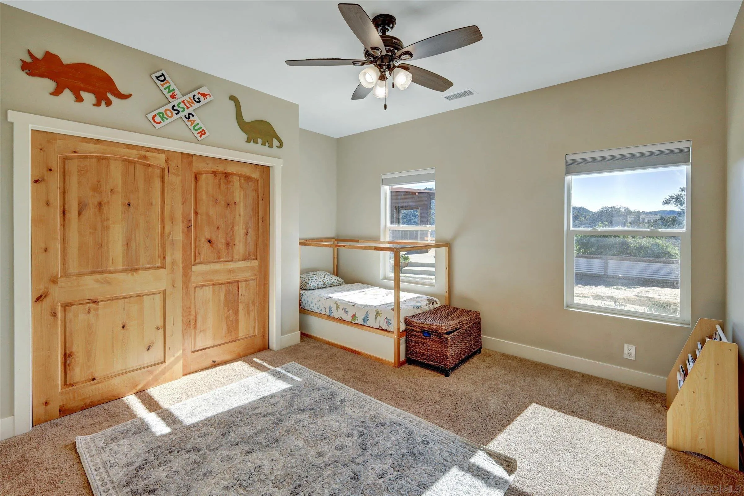 11611 Rancho Heights Road Pala, CA 92059 - Photo 16 of 43 a living room with furniture and a window