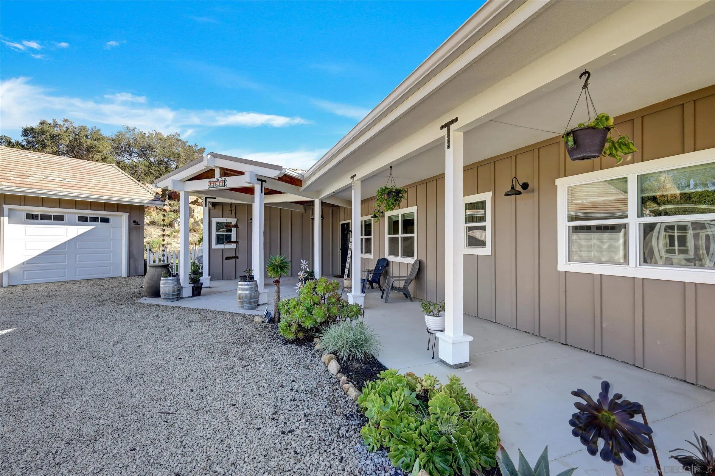 11611 Rancho Heights Road Pala, CA 92059 - Photo 26 of 43 a view of a house with porch and garden