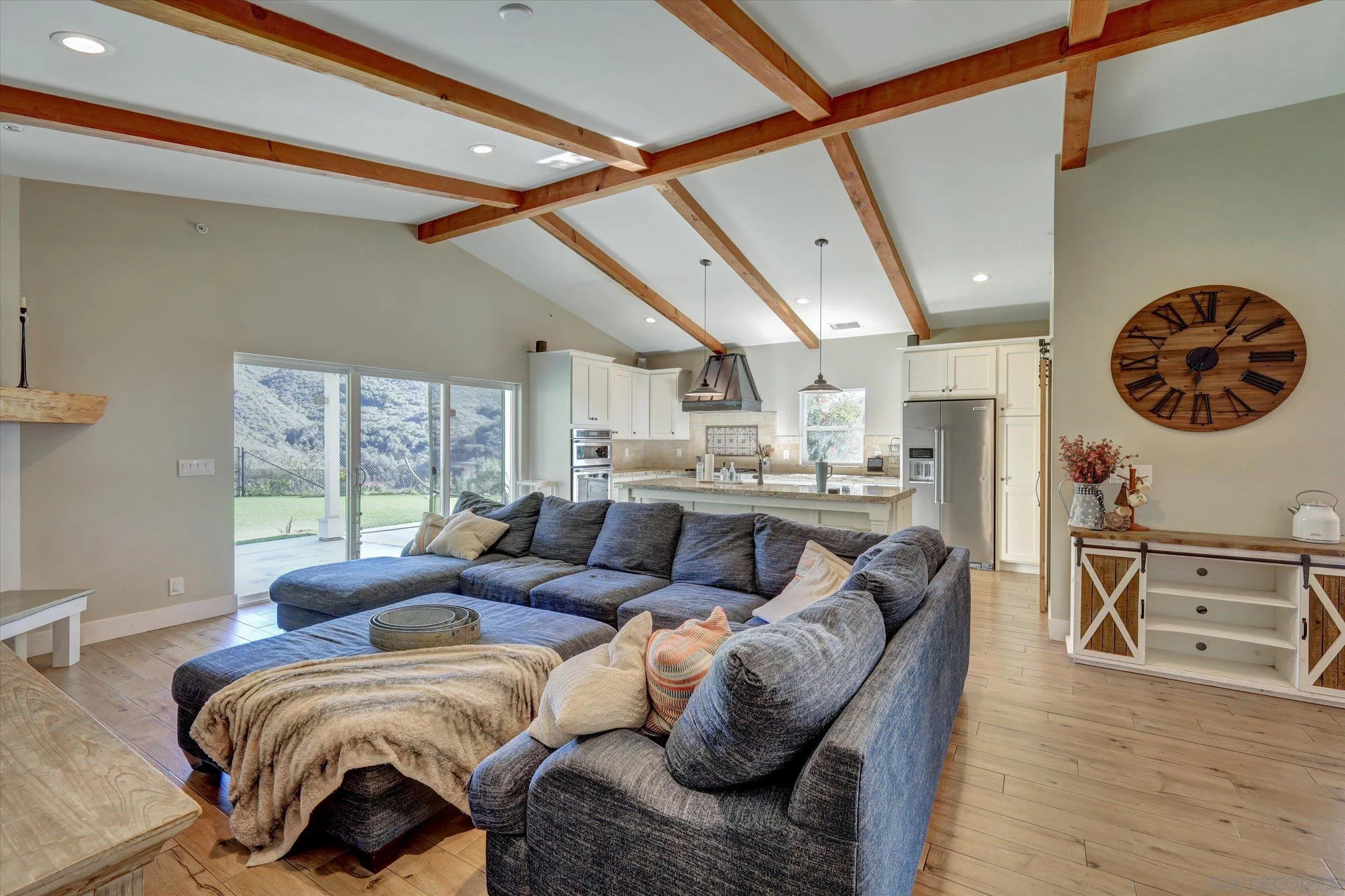 11611 Rancho Heights Road Pala, CA 92059 - Photo 10 of 43 a living room with furniture and wooden floor