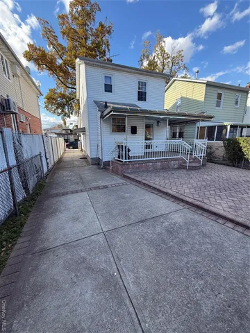 a front view of a house with a porch