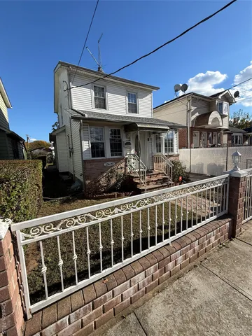 a front view of a house with balcony