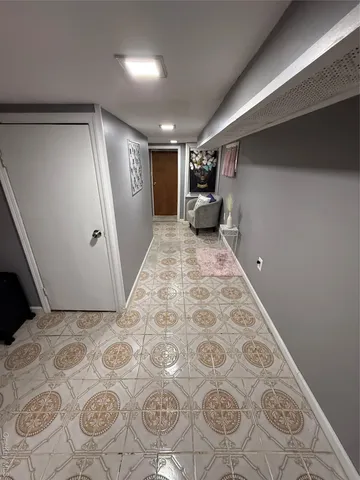 a view of a big room with wooden floor