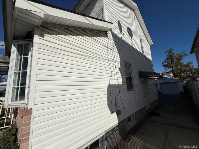 a view of deck with patio and refrigerator