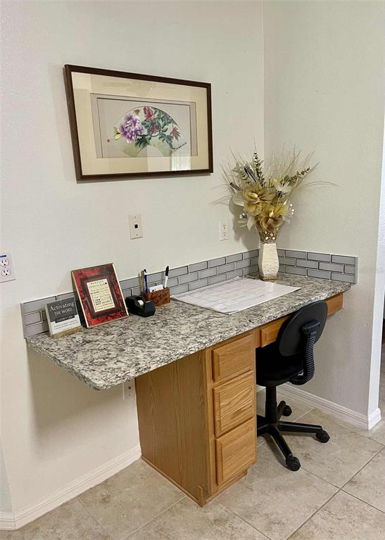 Undisclosed Address Palm Coast, FL 32164 - Photo 18 of 18 a view of workspace with kitchen island