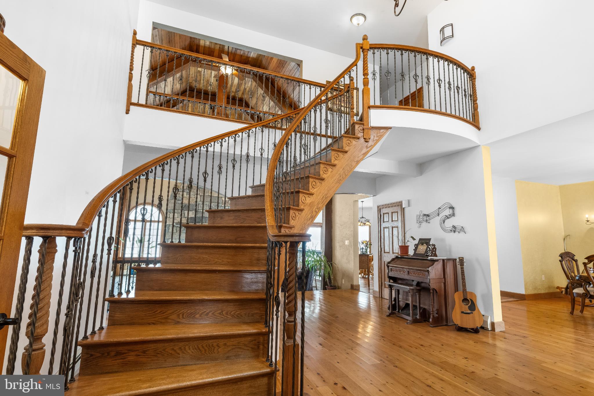216 Merwinsburg Road Effort, PA 18330 - Photo 14 of 75 Elegant spiral staircase in a welcoming foyer.