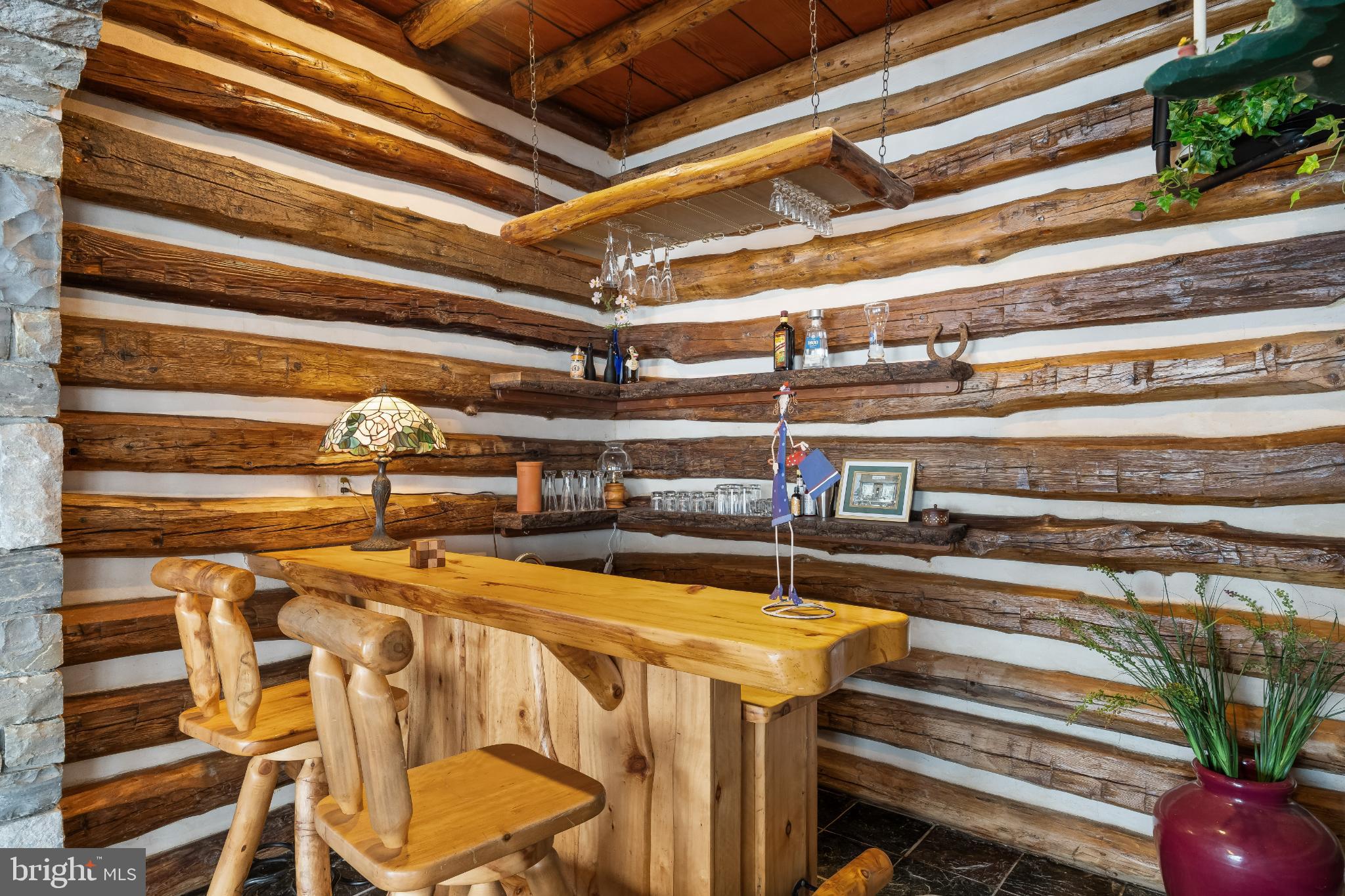 216 Merwinsburg Road Effort, PA 18330 - Photo 21 of 75 Rustic charm in a cozy log cabin bar.