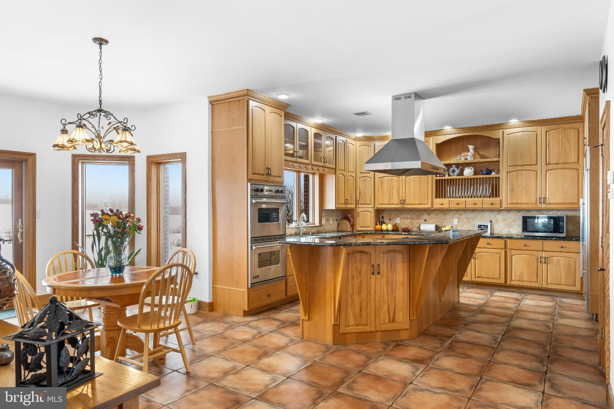 216 Merwinsburg Road Effort, PA 18330 - Photo 23 of 75 Warm wood tones in a spacious kitchen.