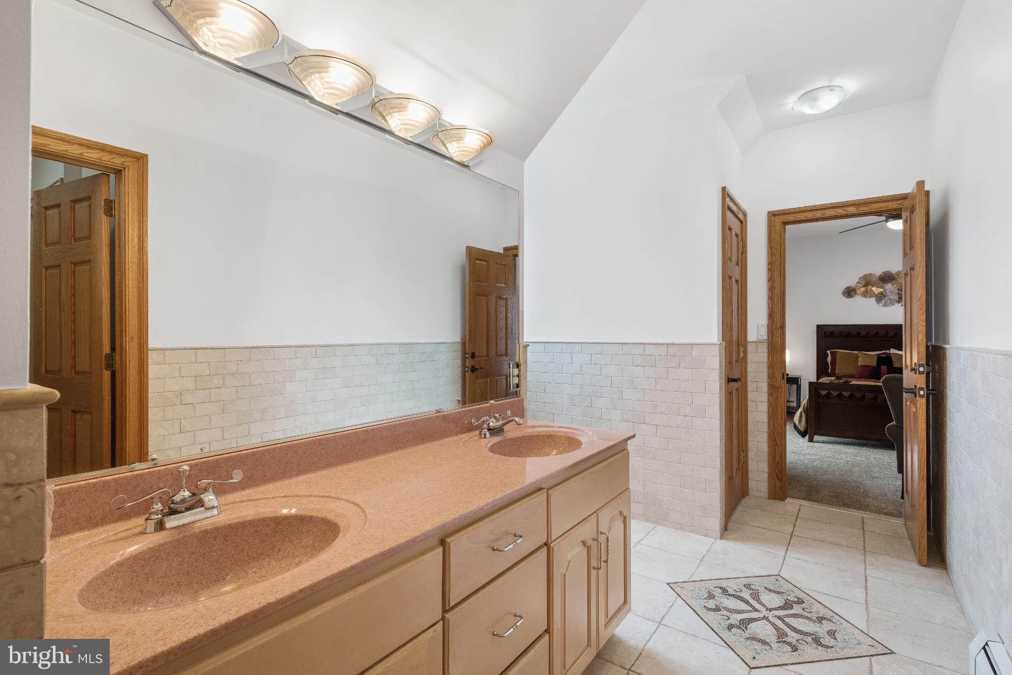 216 Merwinsburg Road Effort, PA 18330 - Photo 48 of 75 Spacious dual-sink bathroom with elegant tiles.