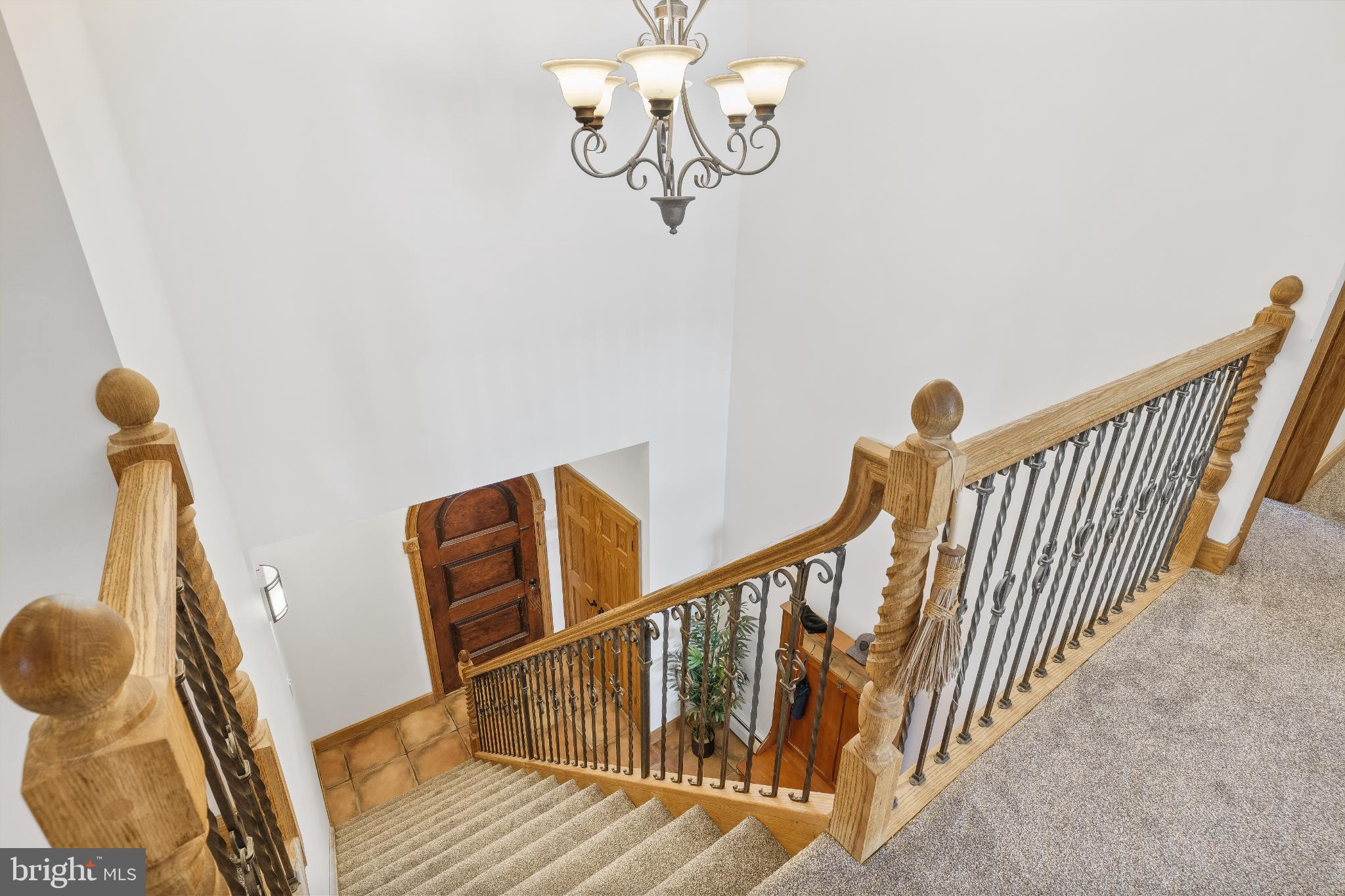 216 Merwinsburg Road Effort, PA 18330 - Photo 53 of 75 Elegant staircase with charming chandelier.