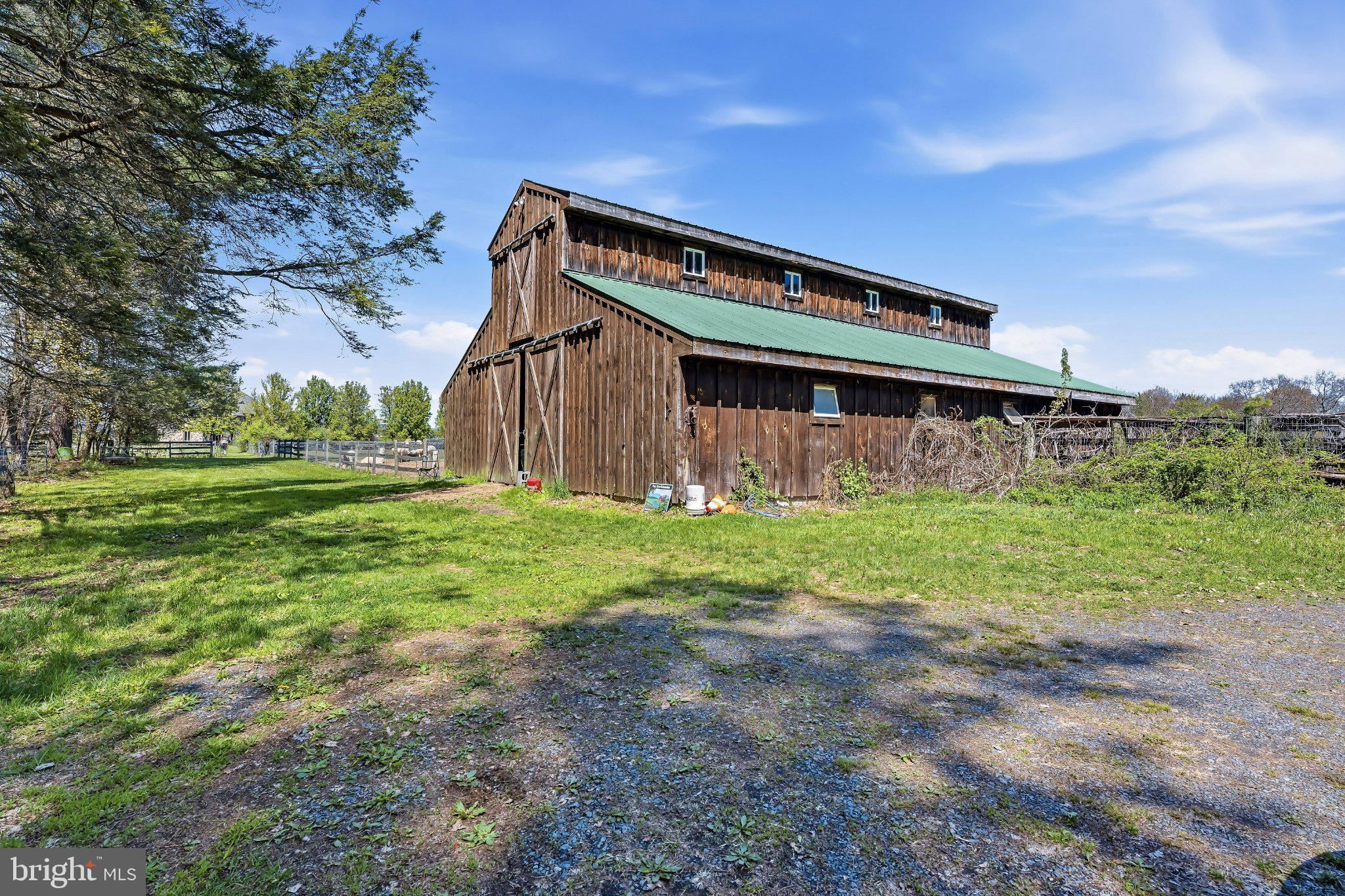 216 Merwinsburg Road Effort, PA 18330 - Photo 65 of 75 Rustic barn amidst lush greenery.