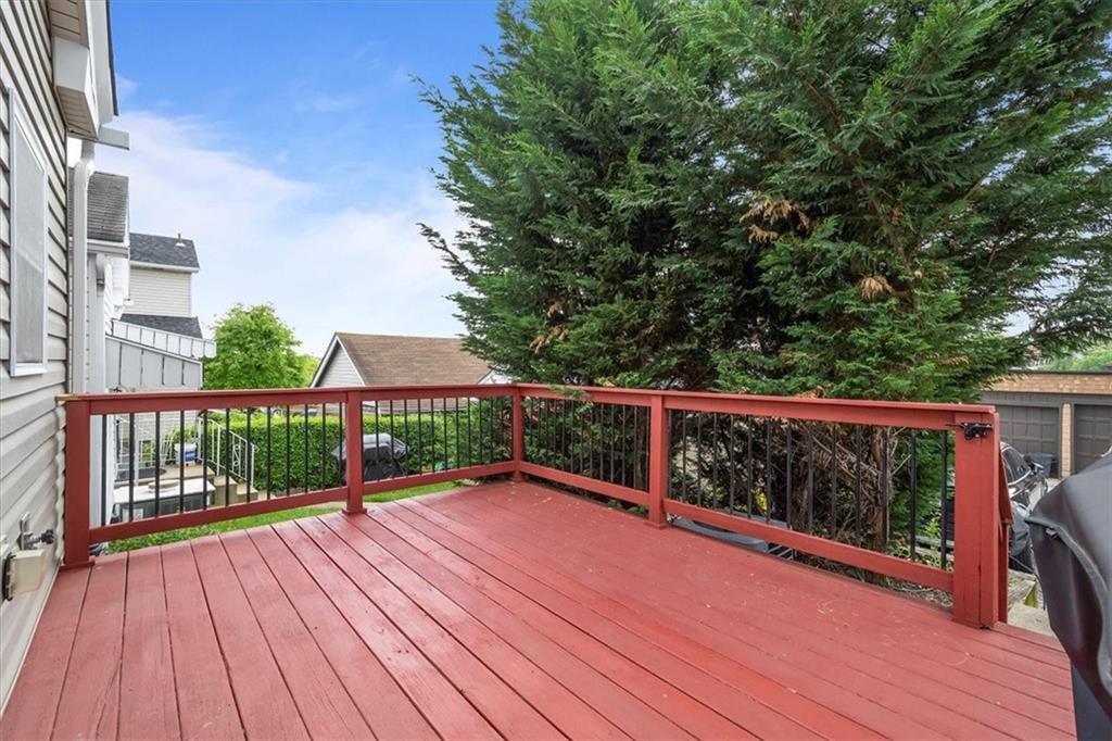 226 Bigham Street Pittsburgh, PA 15211 - Photo 21 of 25 a view of a deck with wooden floor and fence