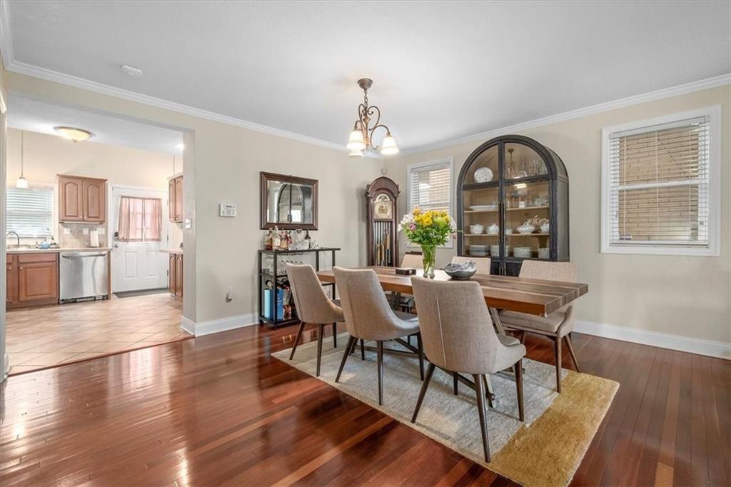 226 Bigham Street Pittsburgh, PA 15211 - Photo 8 of 25 a view of a dining room with furniture window and wooden floor