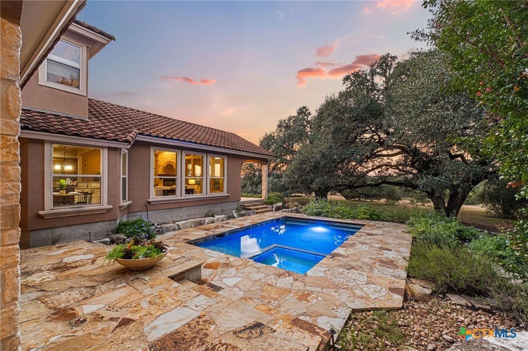 7607 Sky Loop Garden Ridge, TX 78266 - Photo 37 of 43 a view of swimming pool with outdoor seating
