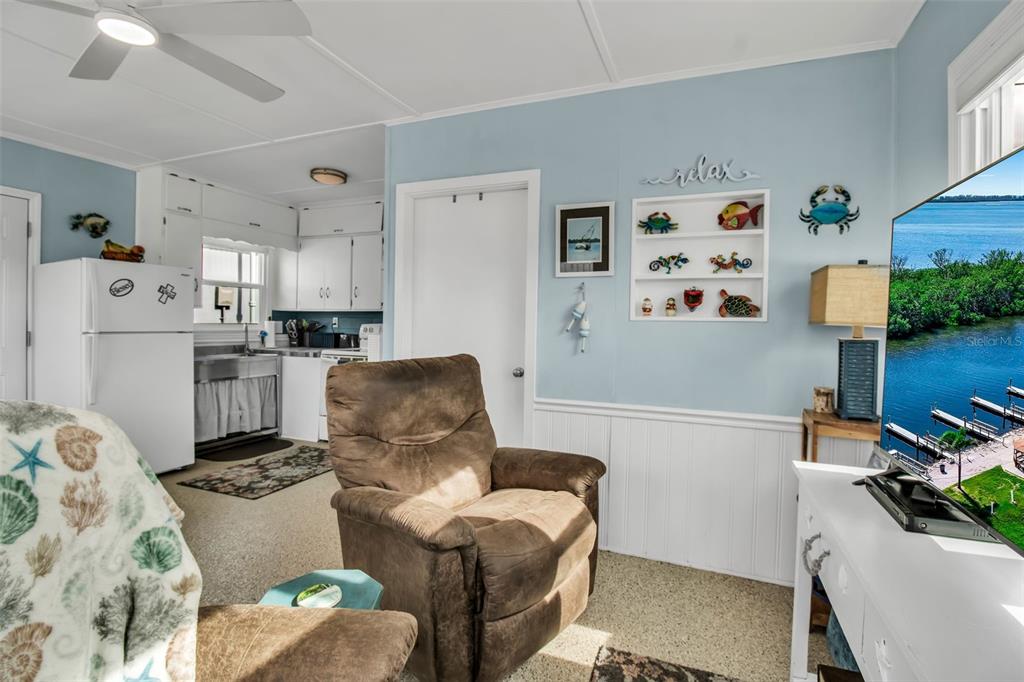 10315 Cortez Road West, Unit 123 Bradenton, FL 34210 - Photo 12 of 64 a living room with furniture and a table