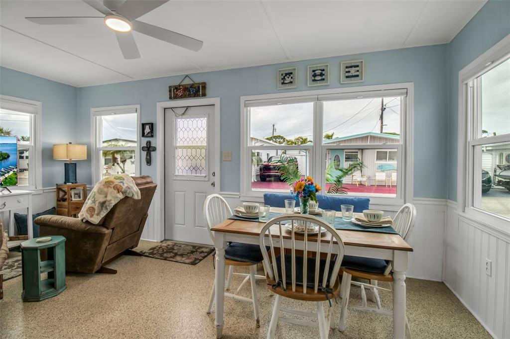 10315 Cortez Road West, Unit 123 Bradenton, FL 34210 - Photo 13 of 64 a view of a livingroom with furniture window and wooden floor